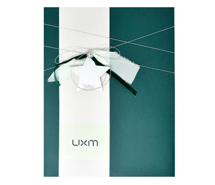 UXM